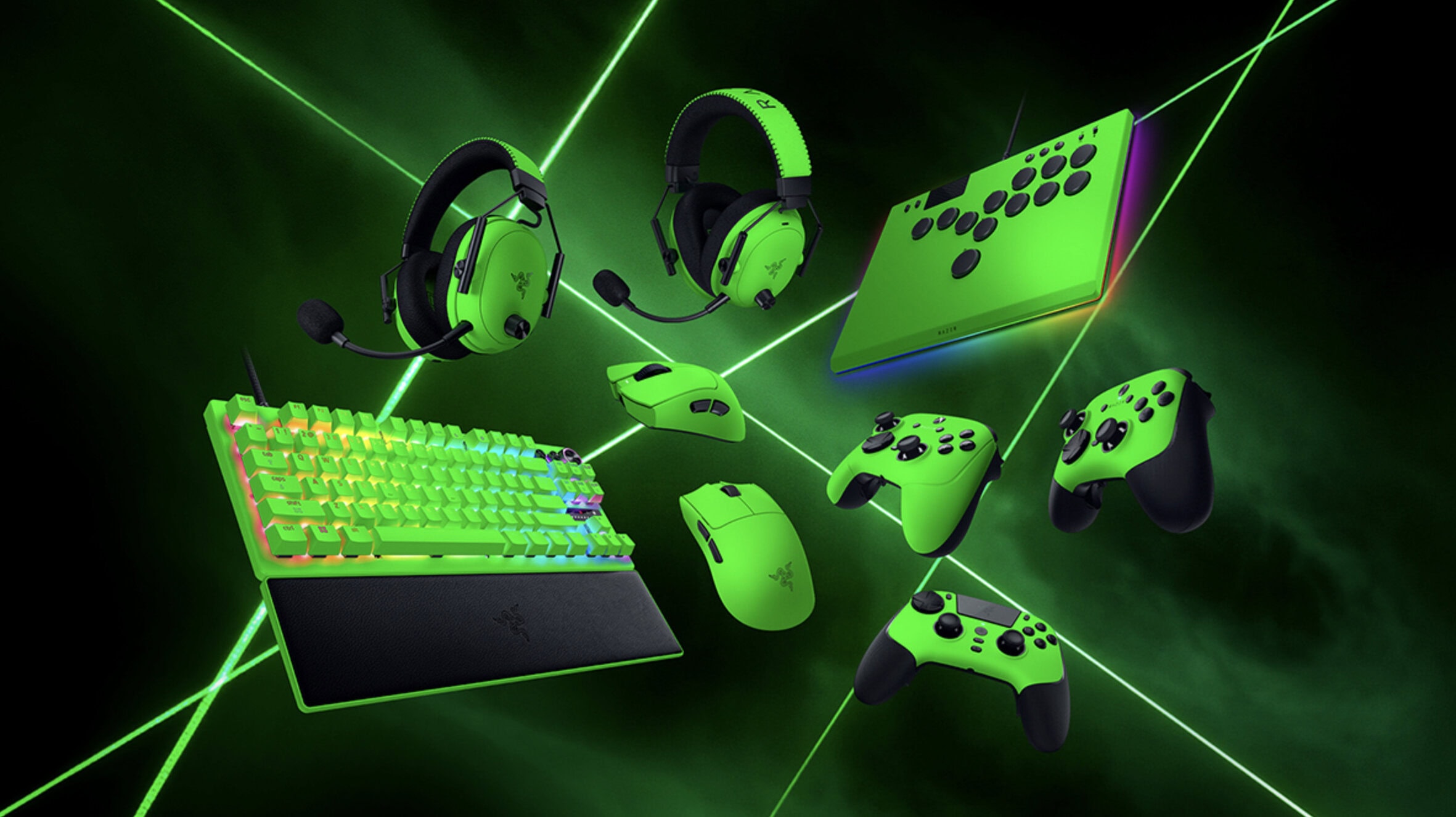Yüksek performanslı gaming ekipmanları, Razer markalı kablosuz kulaklıklar, klavye, fare ve kontrolcülerin yeşil renkli versiyonları, oyuncu teknolojisi, RGB aydınlatmalı ürünler, oyun aksesuarları.