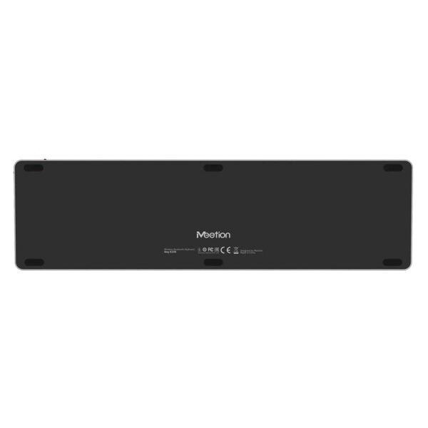 Yataydan görünen siyah renkli Meetion kablosuz Bluetooth klavye, arka tarafta detaylı teknik bilgiler ve marka logosu ile, şık ve modern tasarımıyla teknoloji ve oyun tutkunlarının tercihi.
