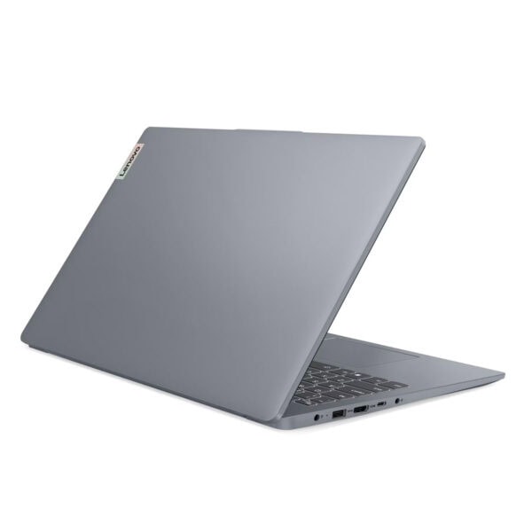 Alt Metin: Gümüş renkli Lenovo dizüstü bilgisayar, hafif ve şık tasarımıyla detaylı özellikleriyle dikkat çekiyor. İş ve eğlence amaçlı kullanımlar için ideal, bağlantı portlarıyla zengin.