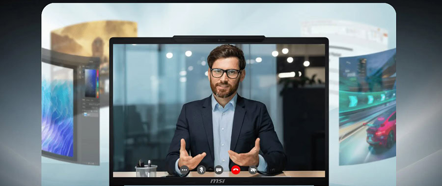 Genç adam, MSI Crosshair 16 Max HX dizüstü bilgisayar ekranında video konferans yaparken gülümsüyor ve el hareketleriyle iletişim kuruyor.